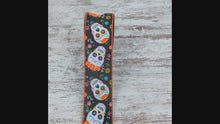 Load and play video in Gallery viewer, Day of The Dead Sugar Skulls Wired Edge Ribbon : Black - 2.5 Inches x 10 Yards (30 Feet)
